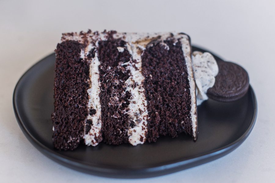 The Best Ever Cookies and Cream Cake with chocolate cake layers, cookies and cream filling, Oreo buttercream and a chocolate drip. #cakebycourtney #cake #cakes #oreocake #cookiesandcreamcake #oreo