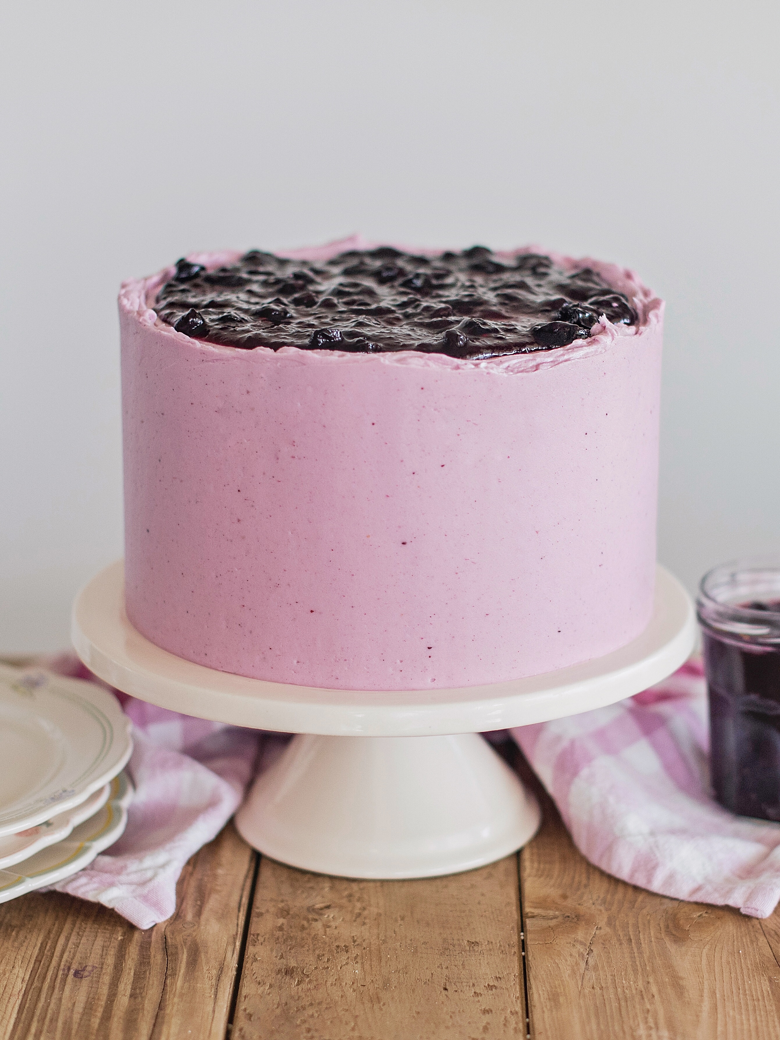 Blueberry Delight Cake - Nilla wafer crust, lemon ricotta cake layers, ricotta filling, blueberry compote and blueberry buttercream. #cakebycourtney #cake #blueberrydelightcake #stackingcakes #caketutorial #cakedecoratingtutorial #blueberry #summercake #summerdessert #blueberrydessert