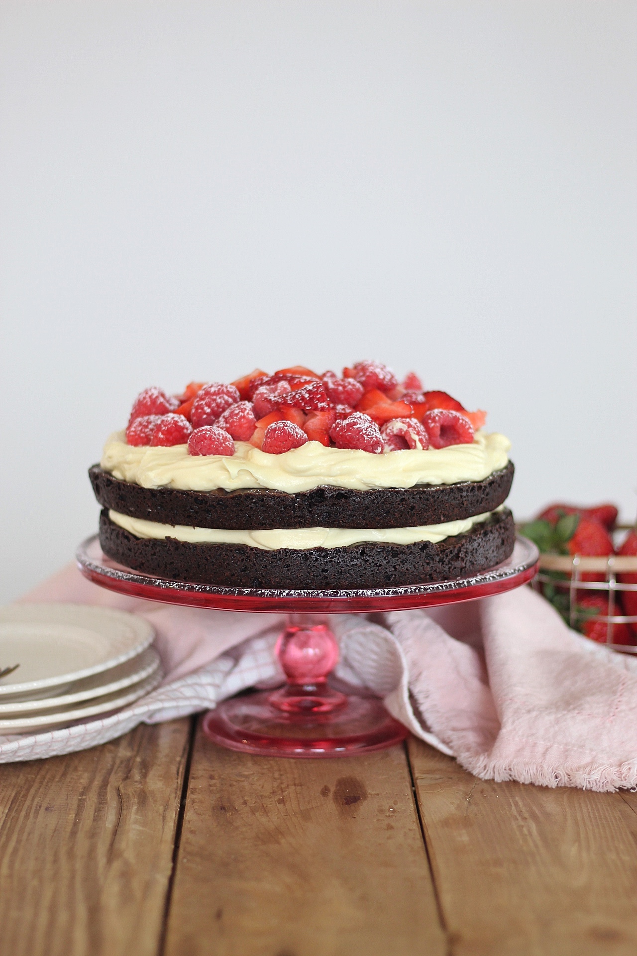 Brownie Berry Torte - decadent brownie layers, topped with a vanilla custard and fresh berries make for the easiest and most delicious, quick-fix dessert. #cakebycourtney #cake #browniecake #brownies #brownieberrytorte #easysbrownierecipe #easydessertrecipe